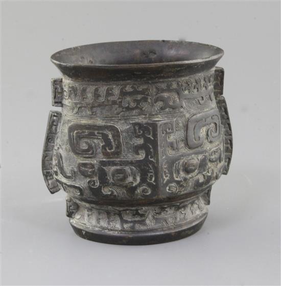 A Chinese archaistic bronze ritual wine cup, Zhi, Shang / Western Zho dynasty or later, height 12.5cm